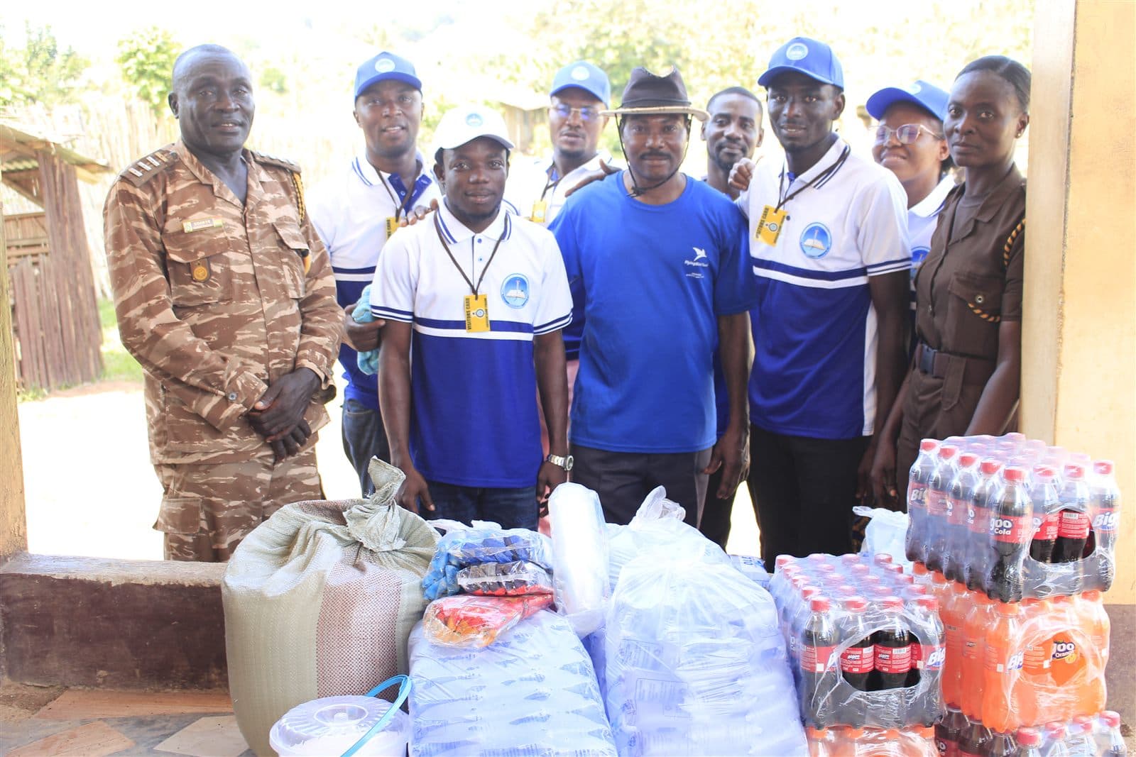 Group photo of the Bethel Inspiration team and prison officers with the donations